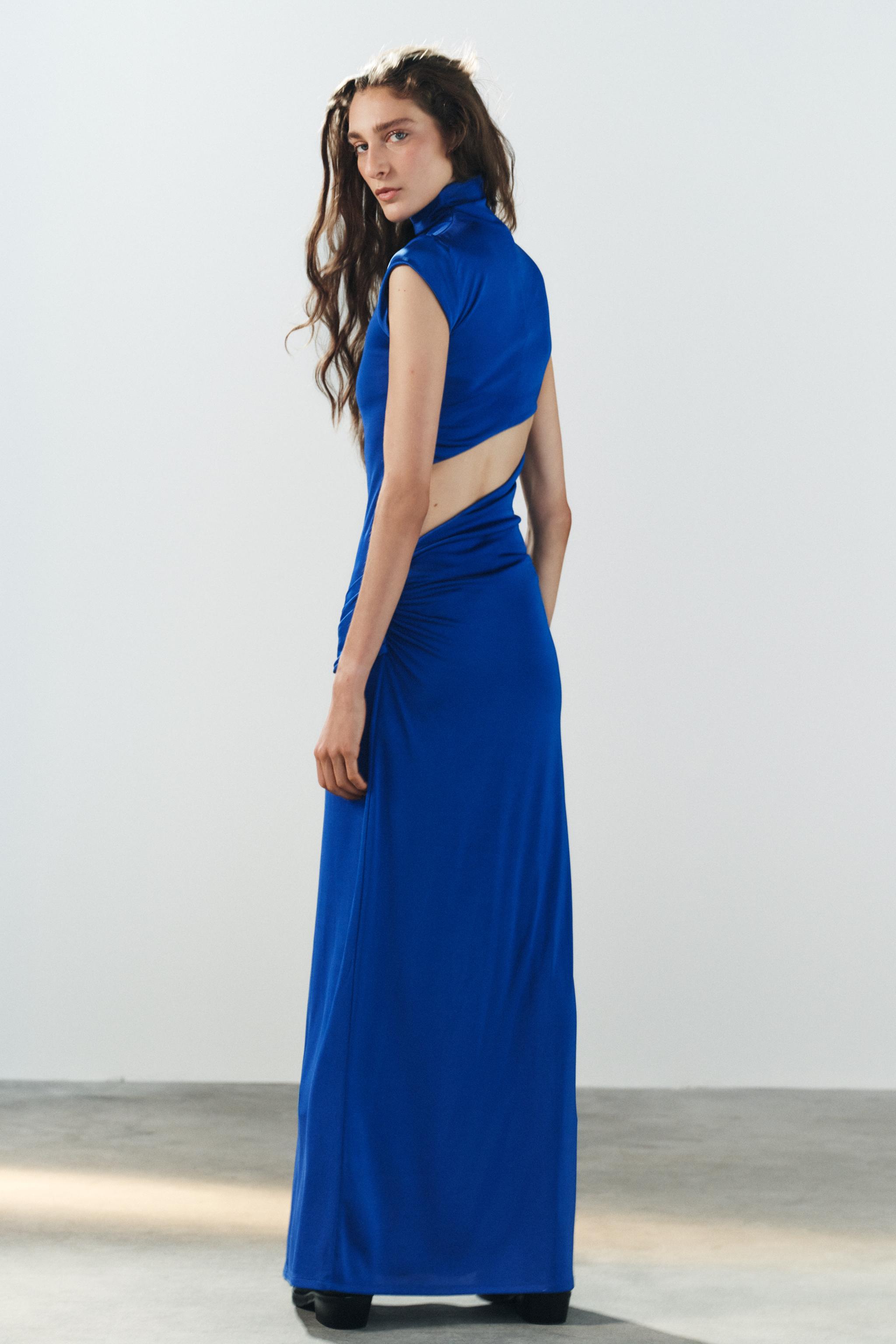 ROBE LONGUE À NŒUD ET OUVERTURE